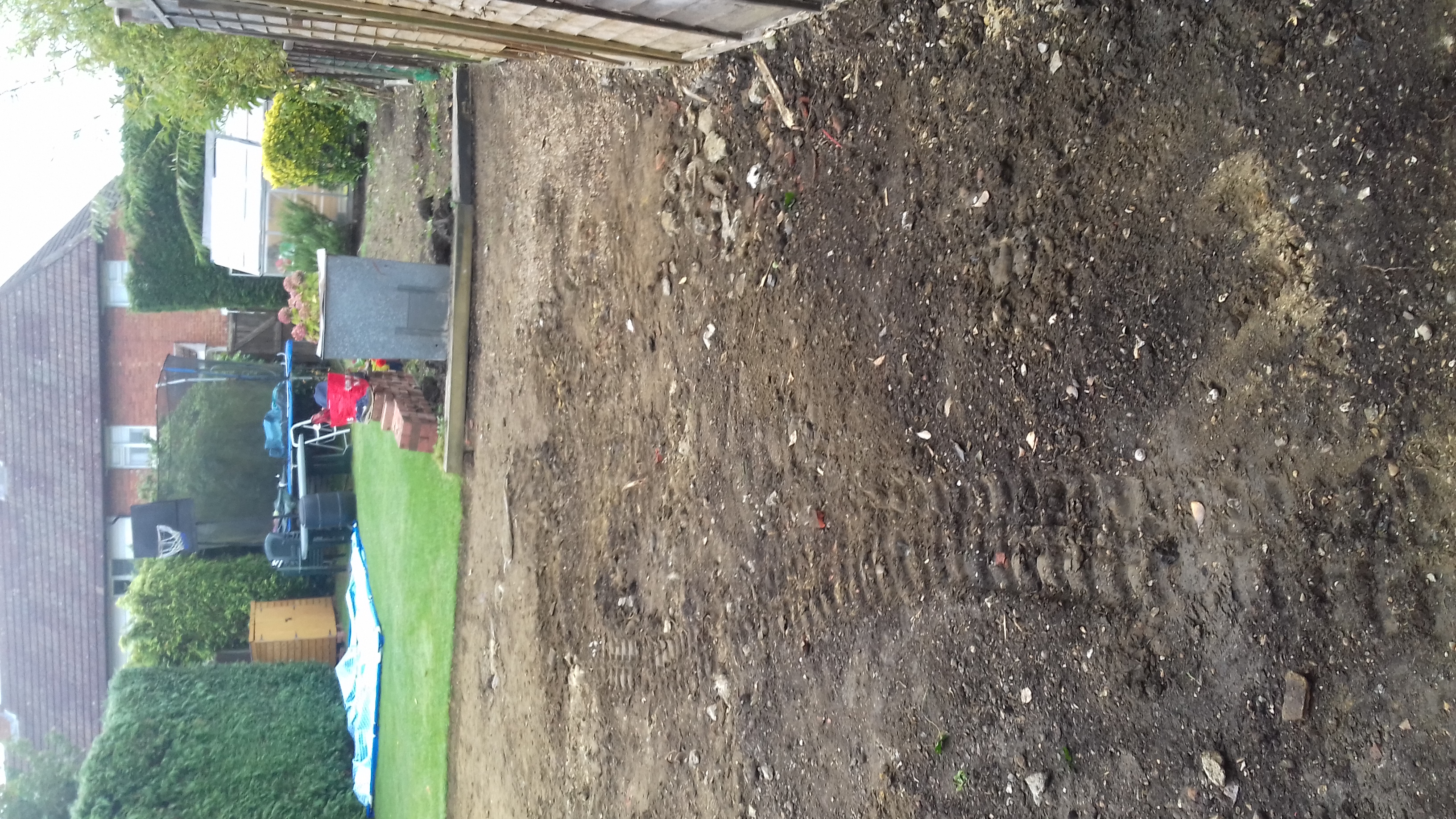 Sandstone patio before cleaning and relaying