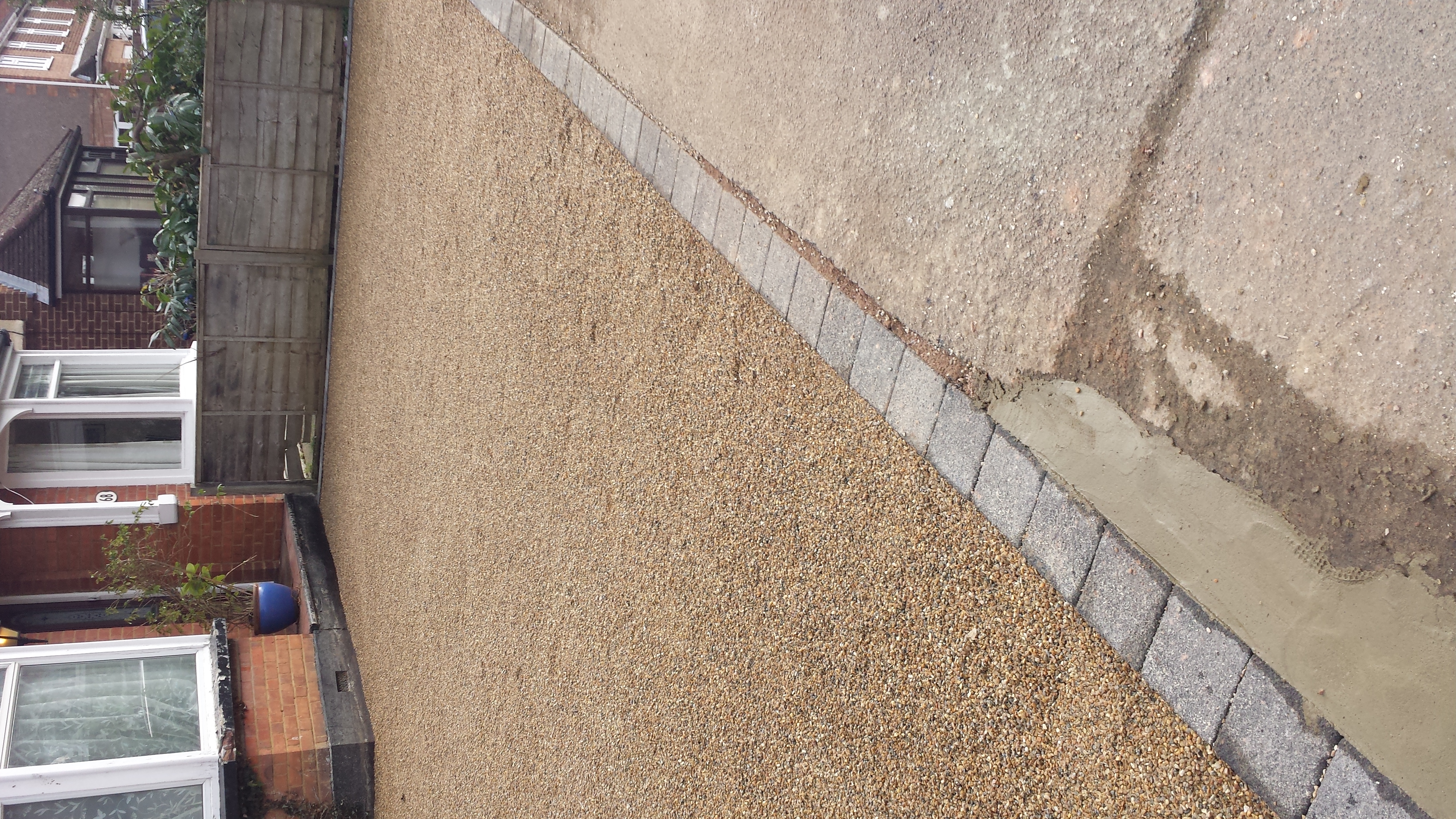 Driveway after tar and chip surfacing