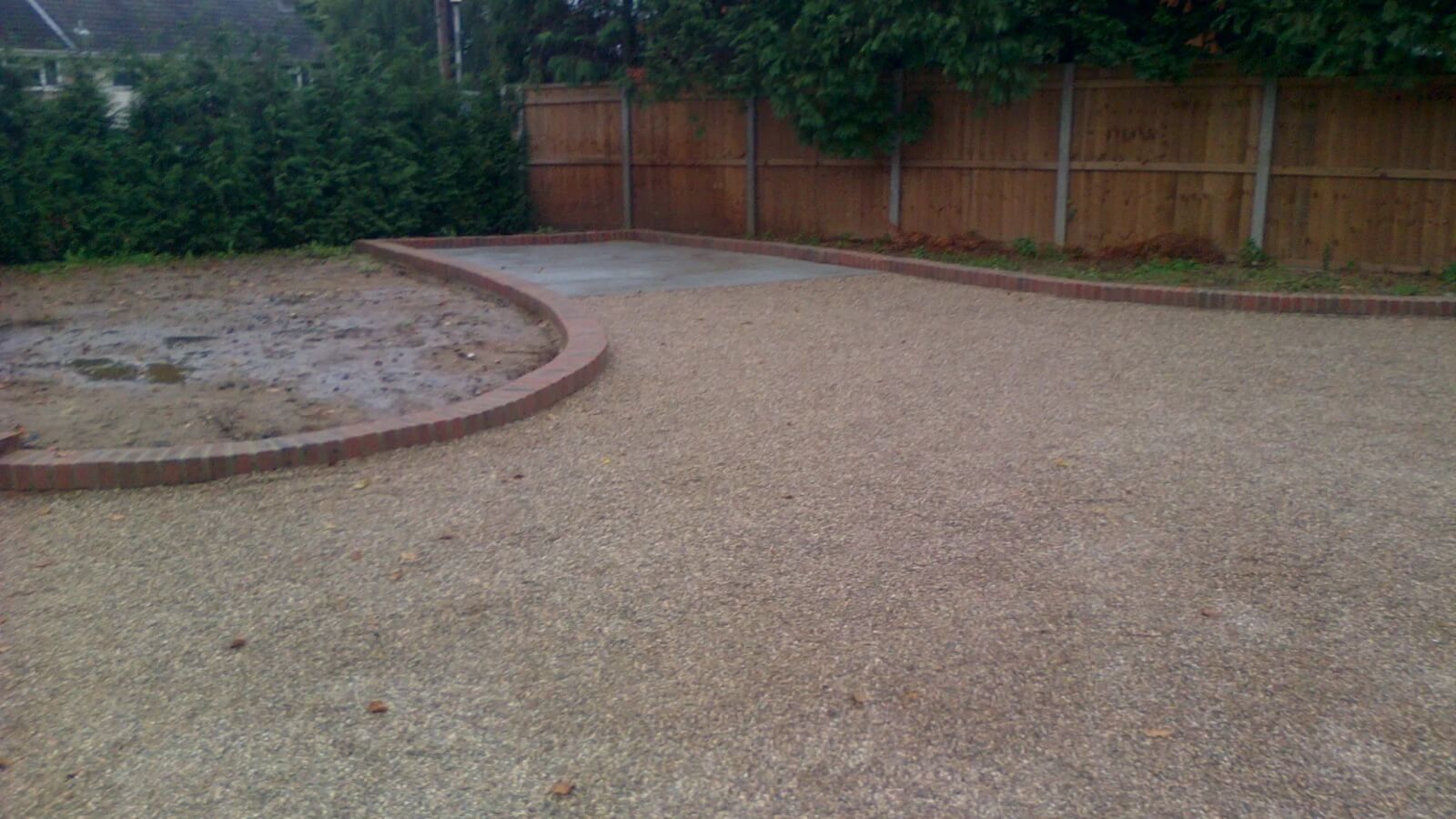 Tar and chip surfacing stage showing preparation and application
