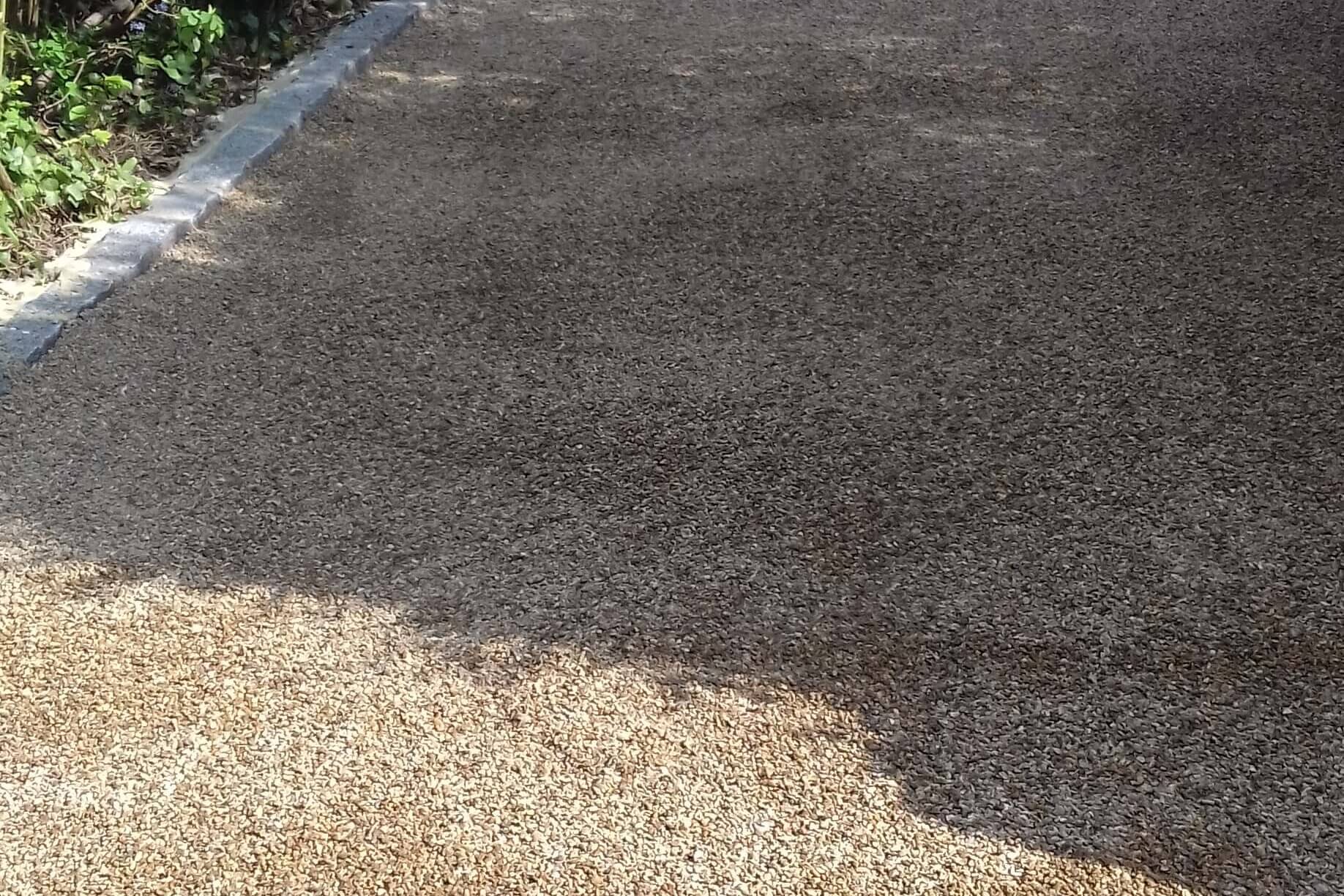 Tar and chip surface texture finish close-up